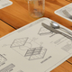 Illustration for article titled Blueprint Placemats Help You Engineer the Worlds Simplest Meals